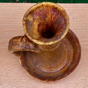 Candle holder in old earthenware signed by the 2 glued aa of the Accolay factory