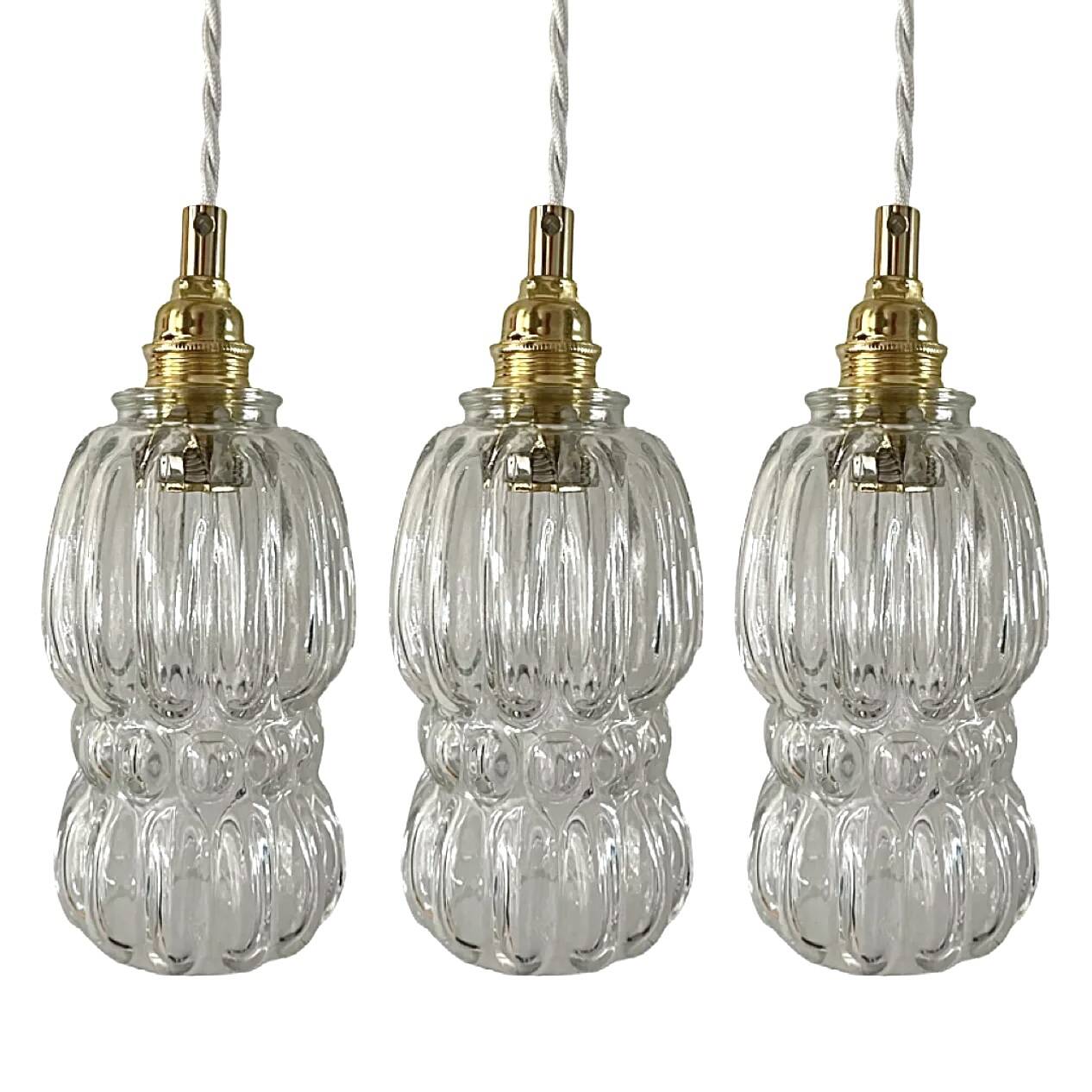 Set of three glass pendant lights of Scandinavian origin