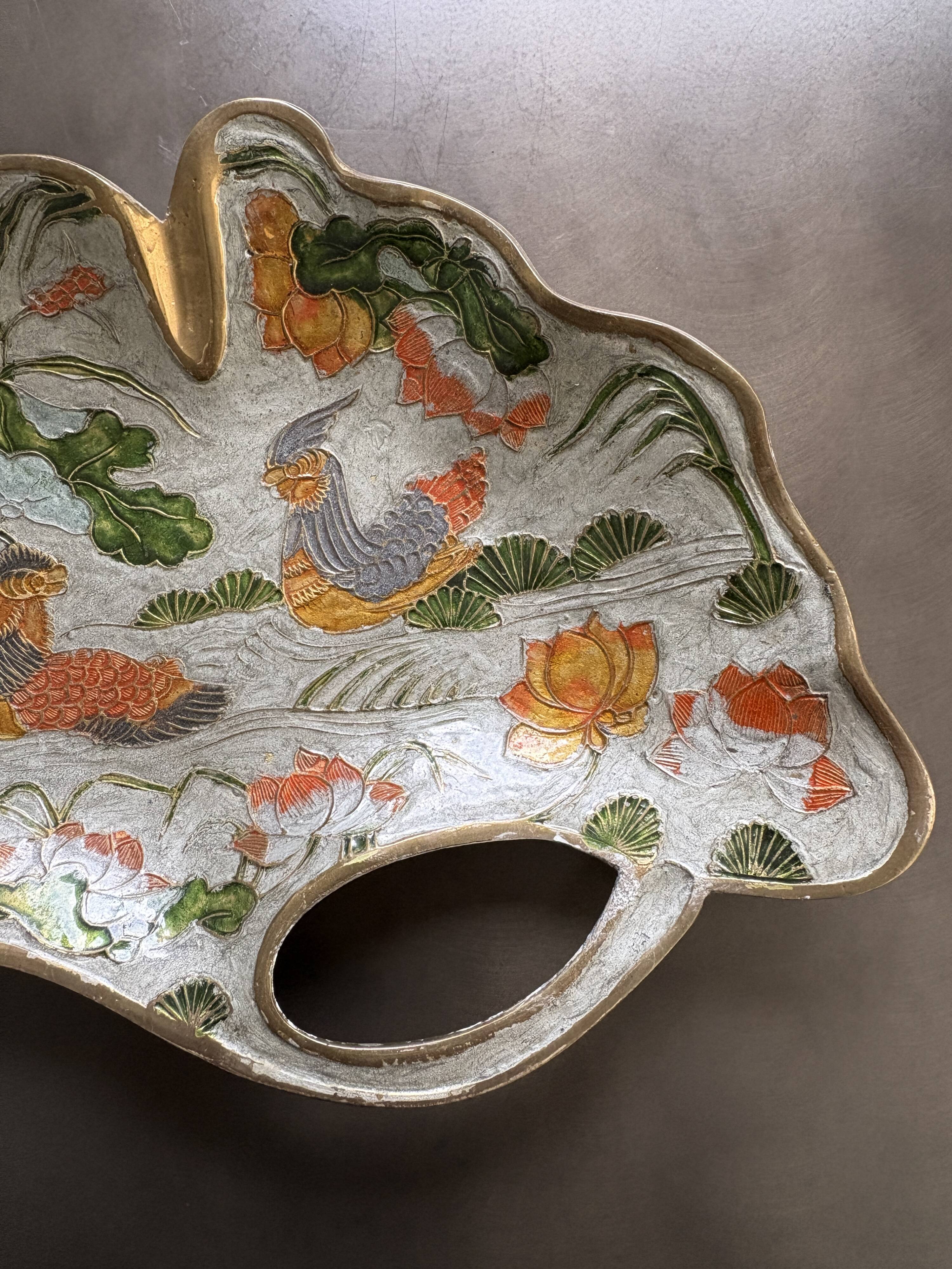 Old brass pocket emptier