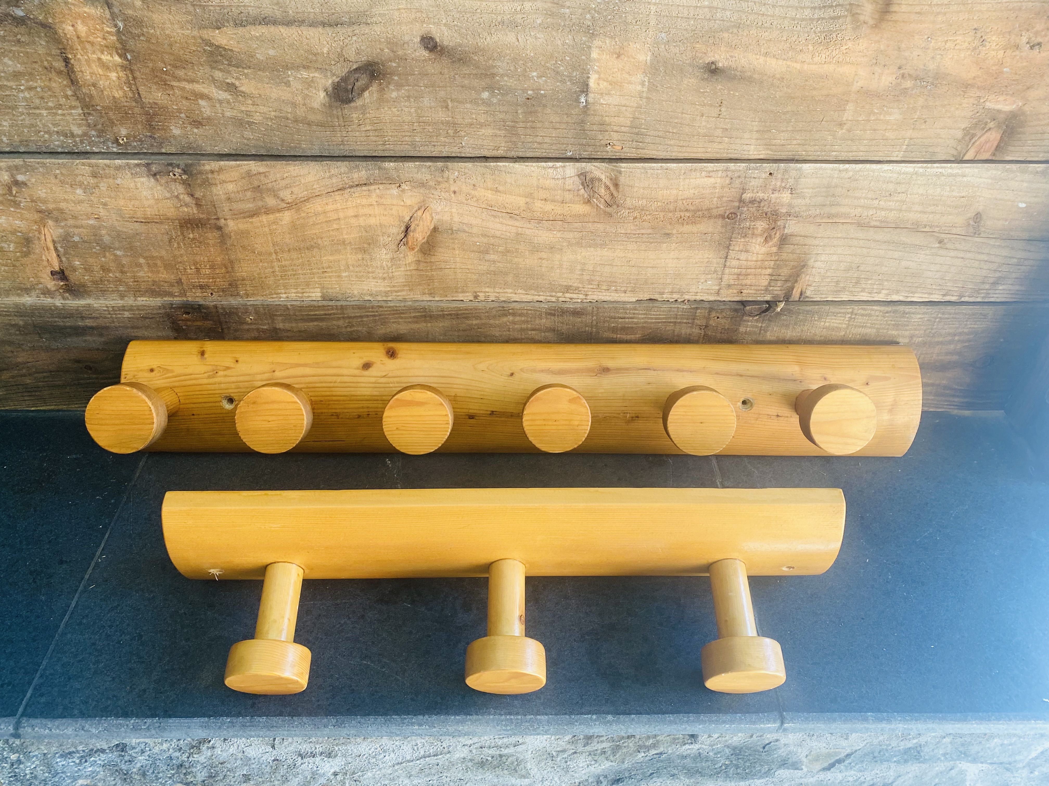 Set of two wooden pateres 60s in the Perriand style.