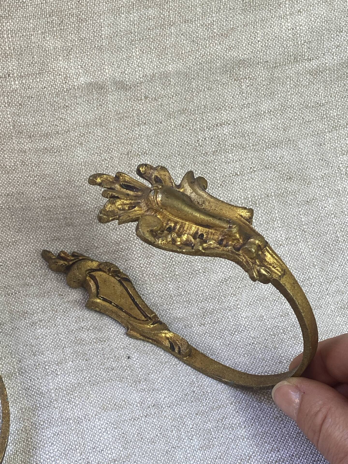 Bronze coat hooks