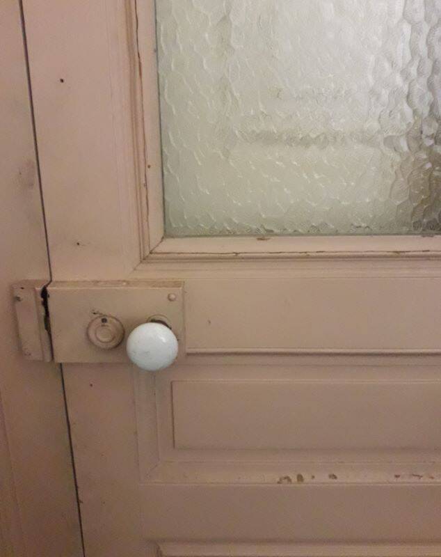 Large glazed door and its old glazed transom.