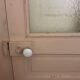 Large glazed door and its old glazed transom.