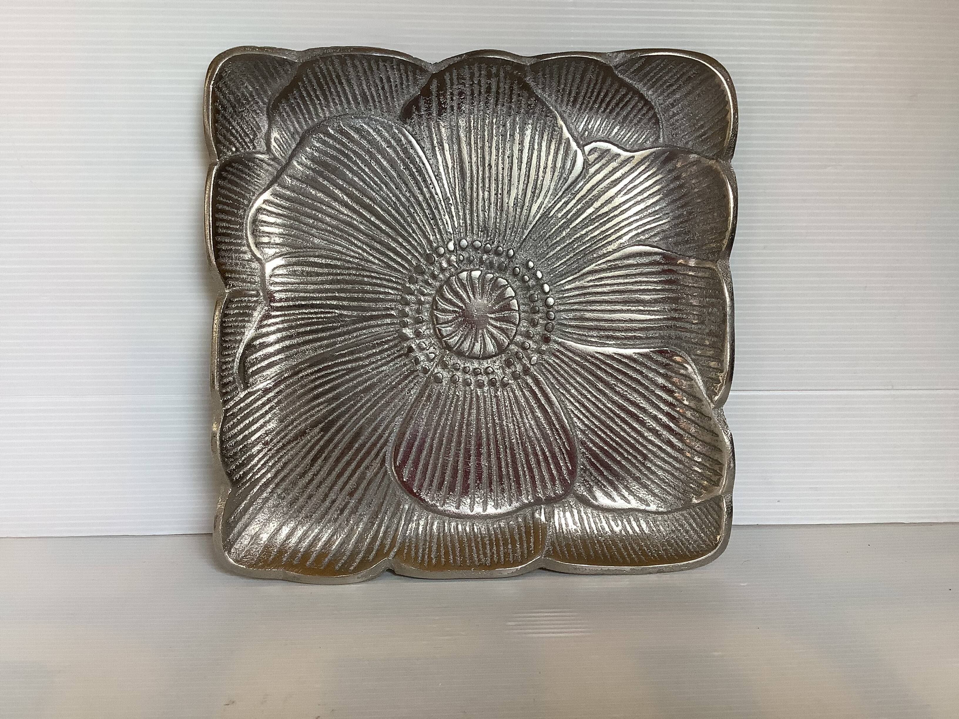 Large empty metal flower pocket