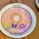 Flat colored porcelain plate, day of the week