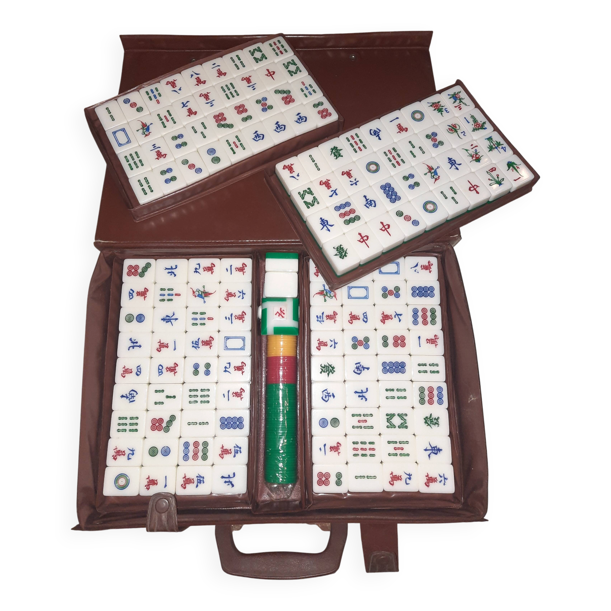 Complete vintage mahjong game with a faux leather case.