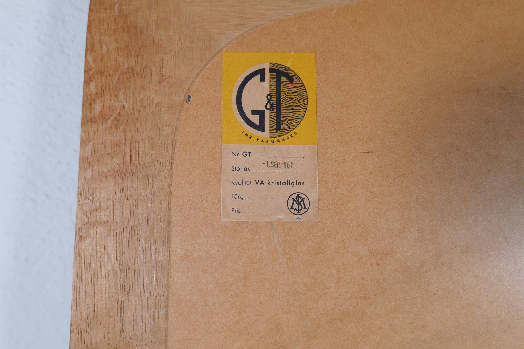 Mid-century modern sculptural wall mirror, oak, crystal glass, Glas & Trä, 1960s