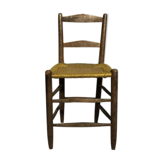 Old wooden chair, mulched seat