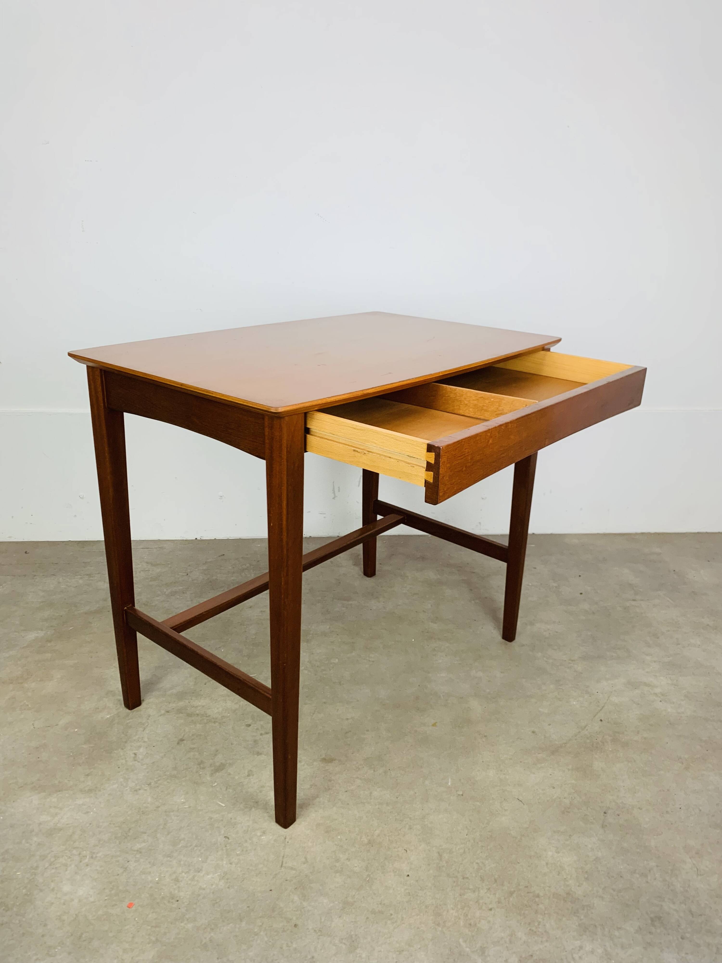 Minimalist Scandinavian teak desk from the 1960s, vintage.