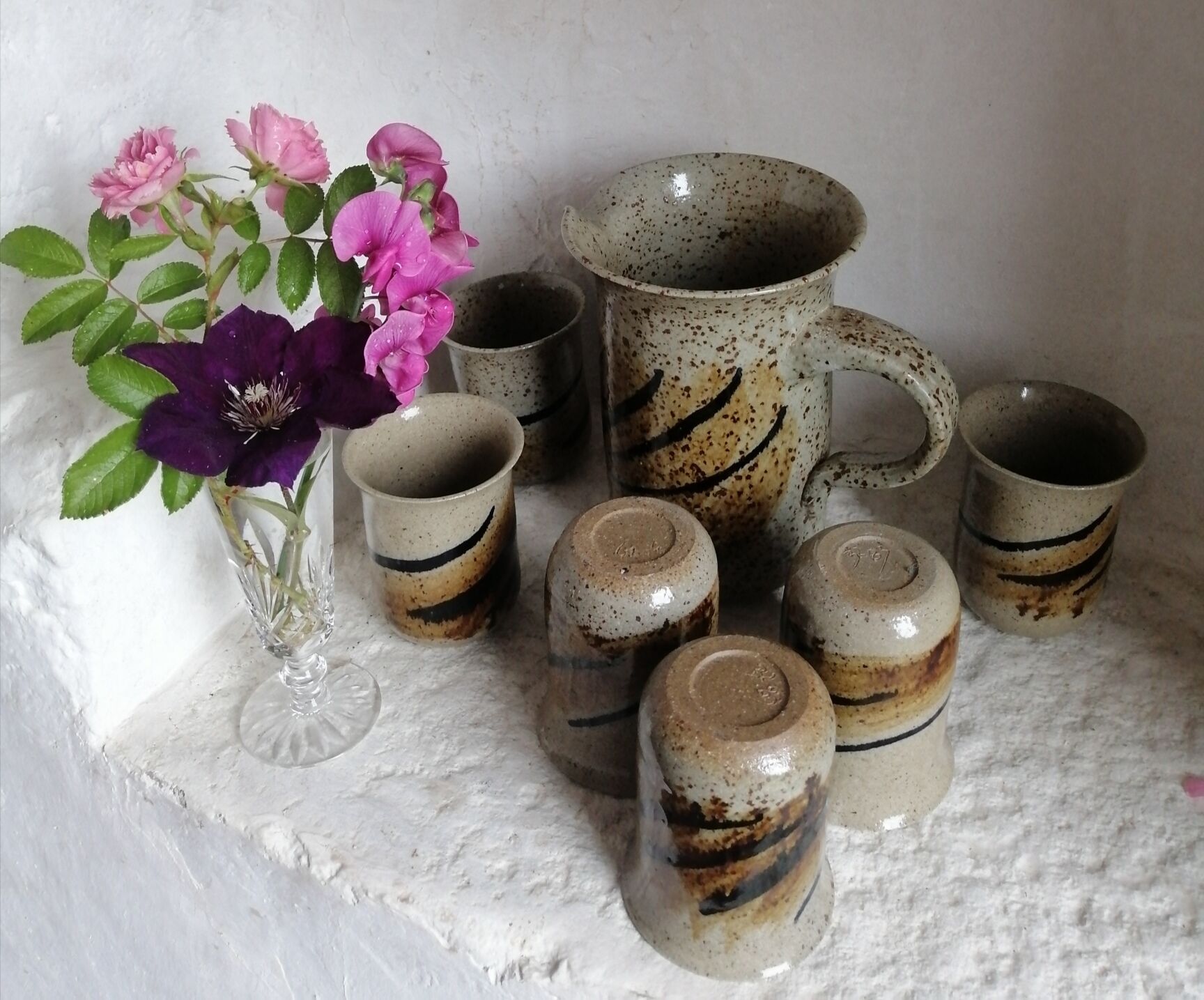 Enamelled sandstone pitcher and glasses