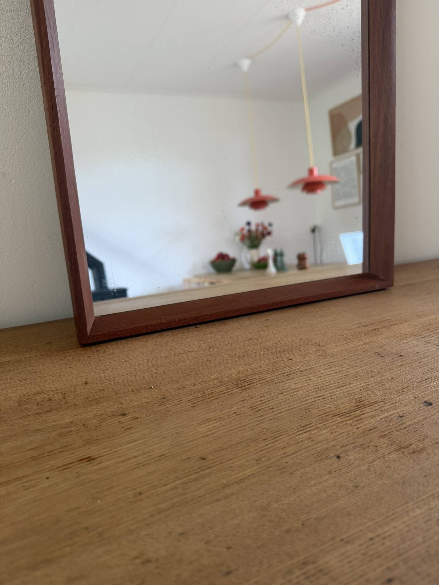Beautiful vintage Danish teak mirror with mittered edges and nice brass det