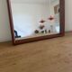 Beautiful vintage Danish teak mirror with mittered edges and nice brass det