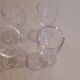 Set of 4 small stemmed glasses for strong alcohol.