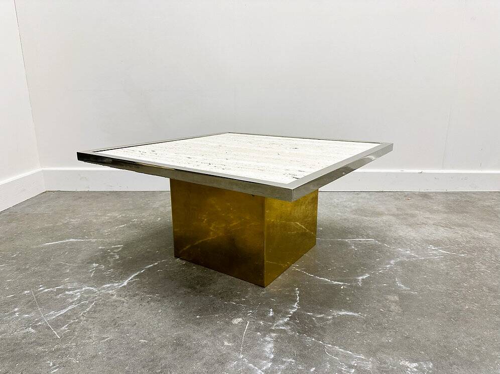 Brute travertine coffee table with brass base and chrome edges, France 1970s.
