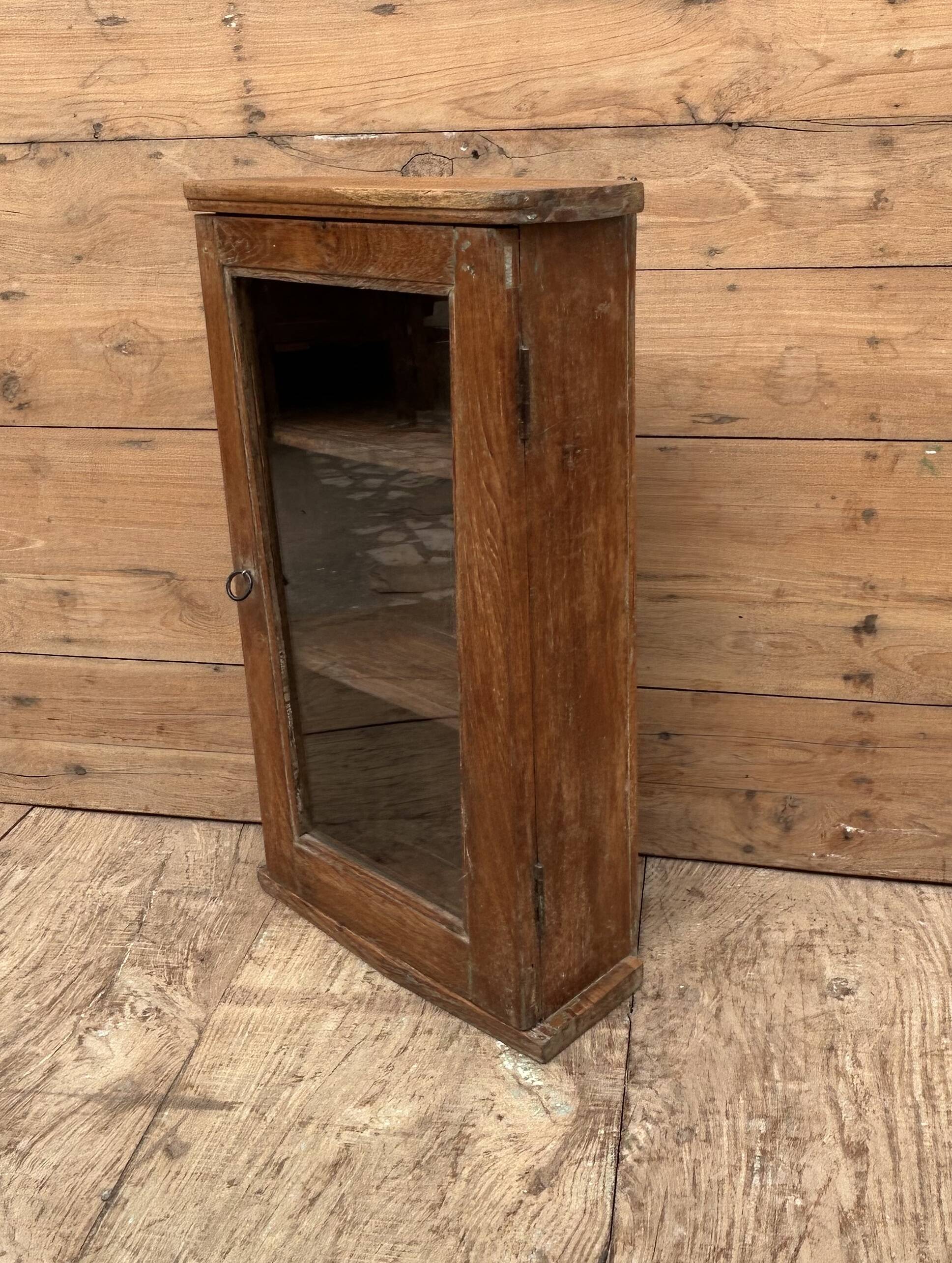 Wall display cabinet in Burmese teak