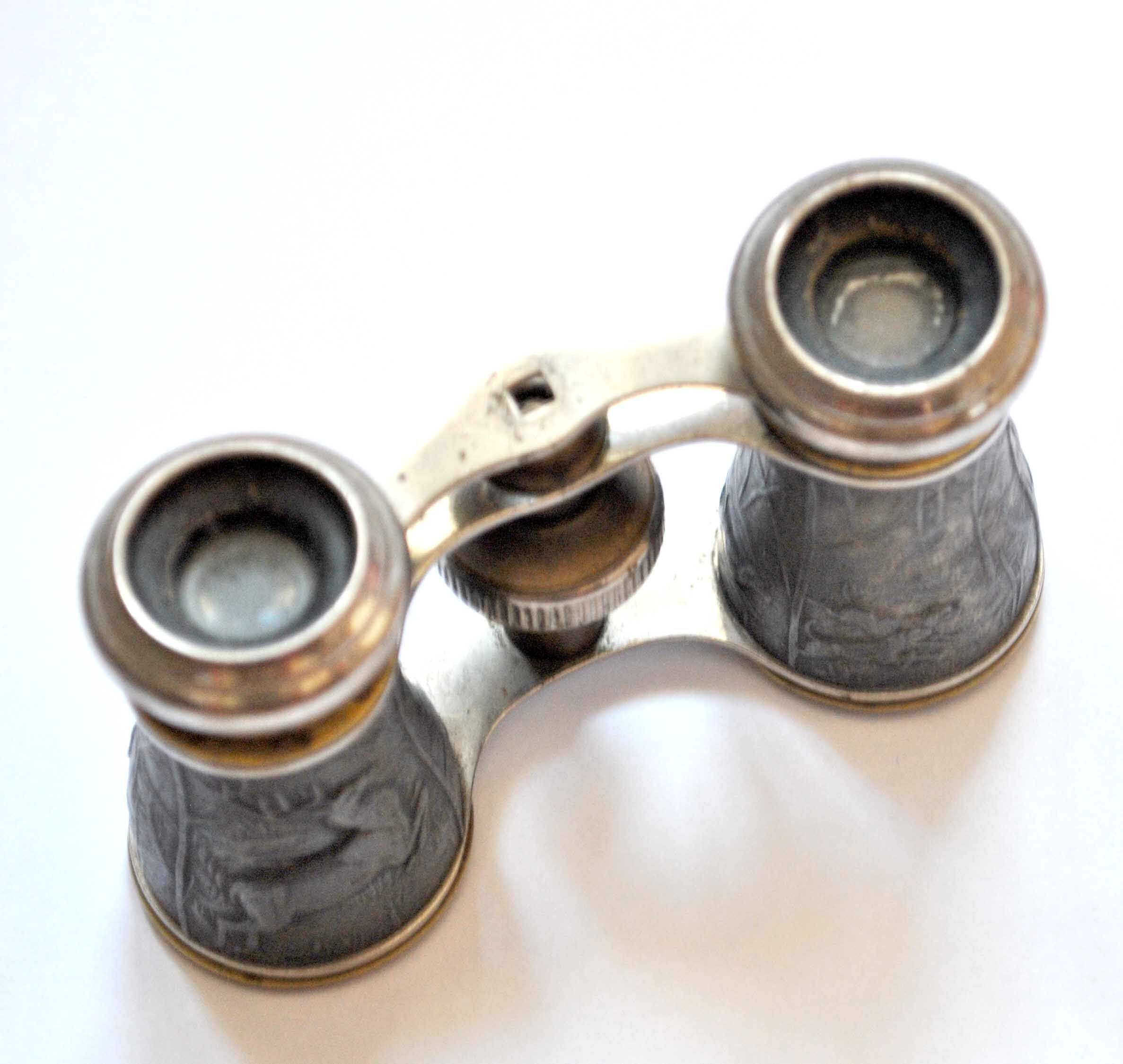 Hunting binoculars or old theater in brass and chrome