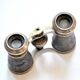 Hunting binoculars or old theater in brass and chrome