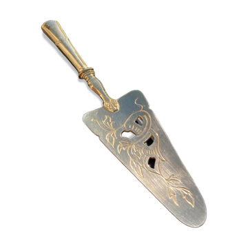 Pelle à tarte en metal doré