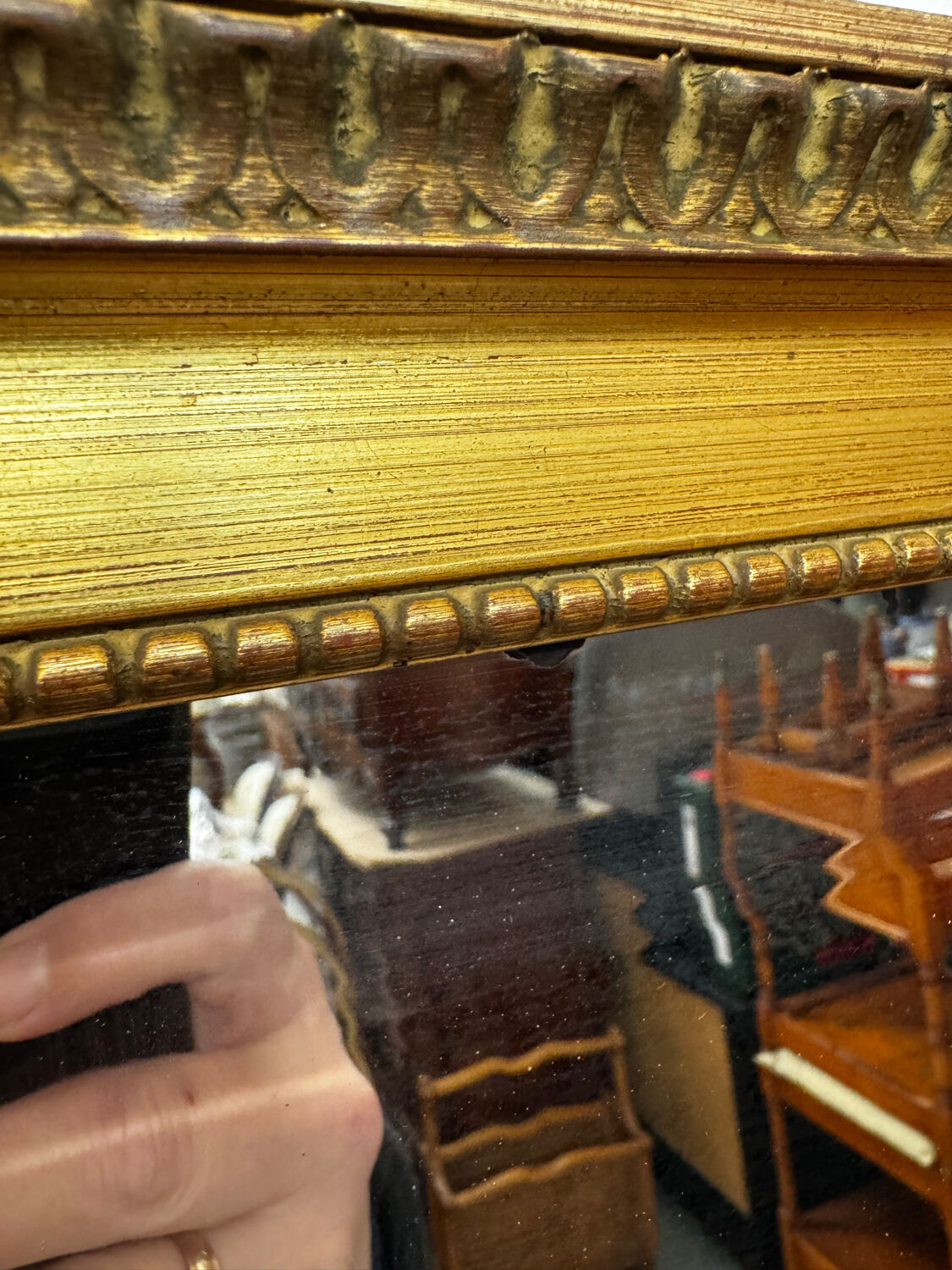 Large gold mirror in the Louis XVI style