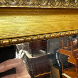 Large gold mirror in the Louis XVI style