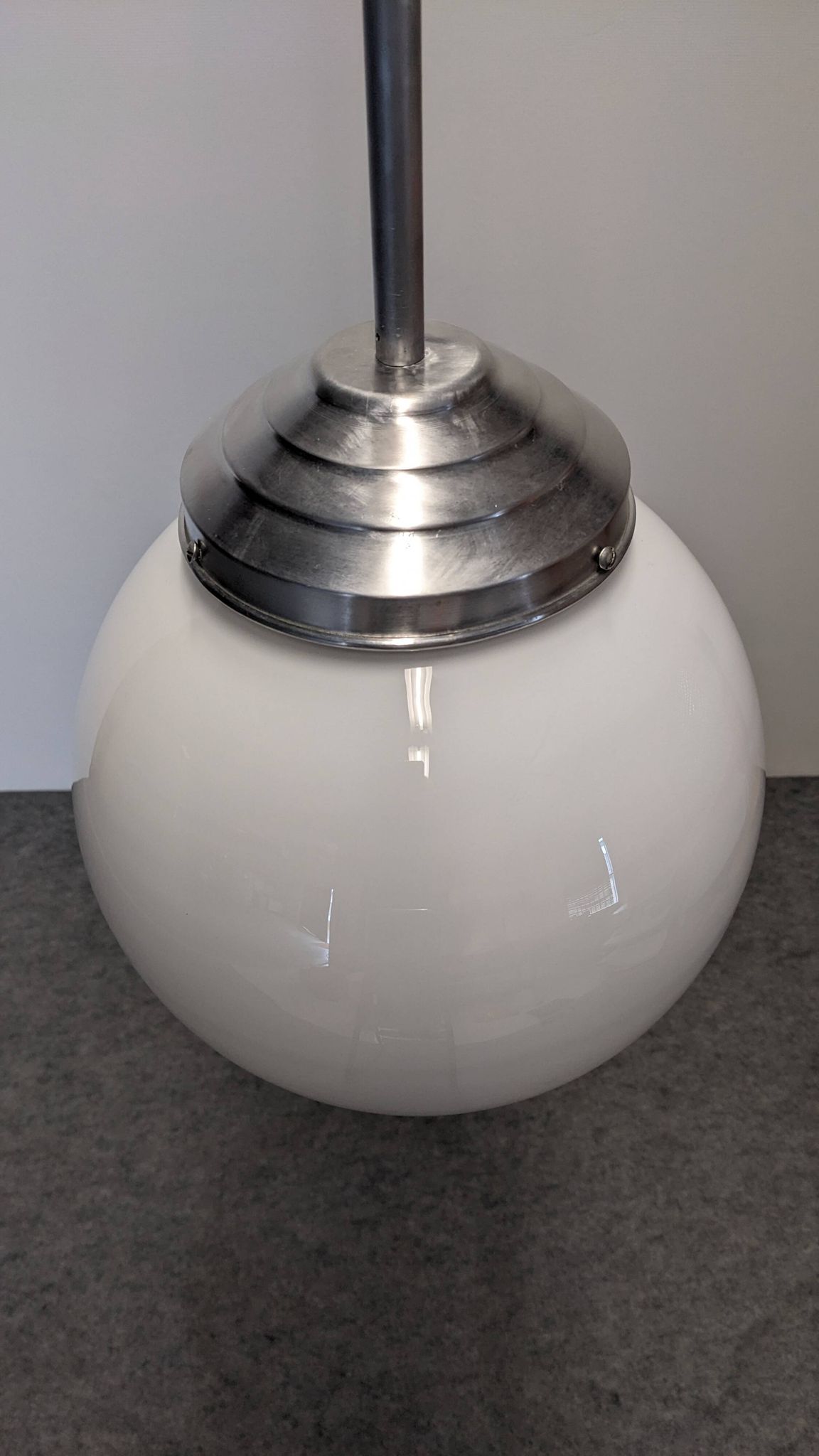 XL Art Deco white opaline ball pendant light, France circa 1920