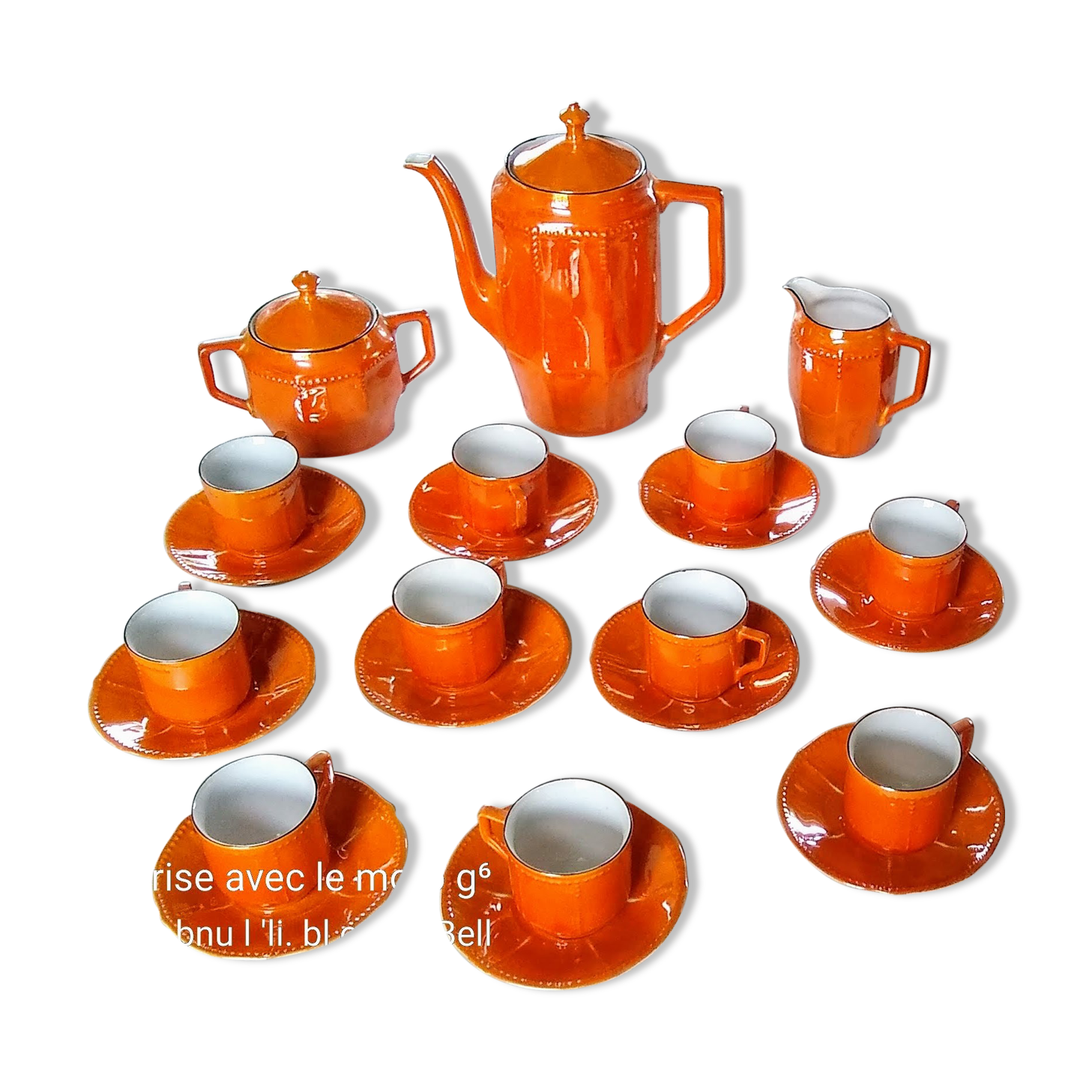 Iridescent orange porcelain coffee set from the 50s-60s with black edging