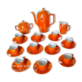 Iridescent orange porcelain coffee set from the 50s-60s with black edging