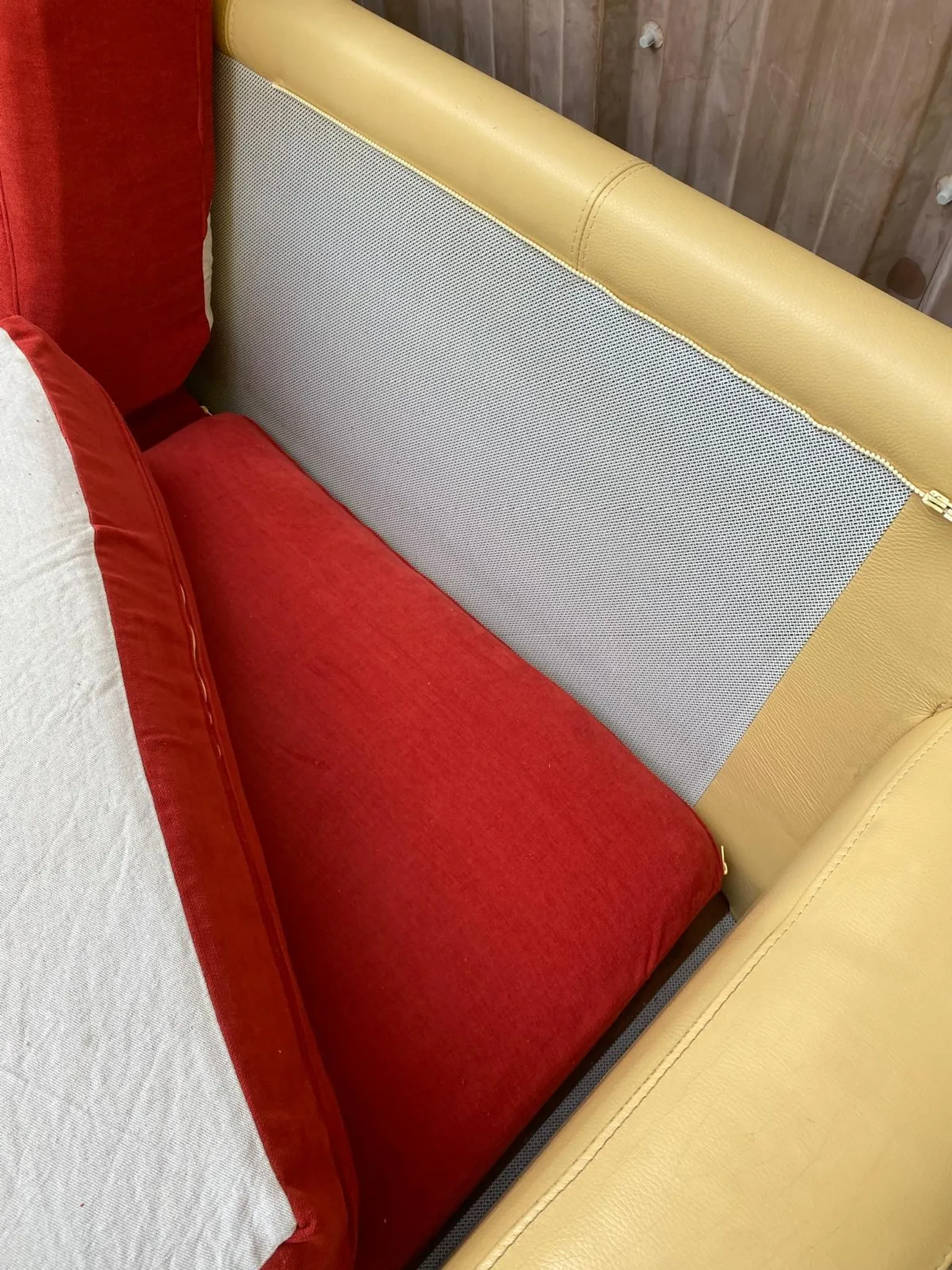 Art Deco 3-seater convertible sofa in genuine beige leather and red fabric from the 1980s.
