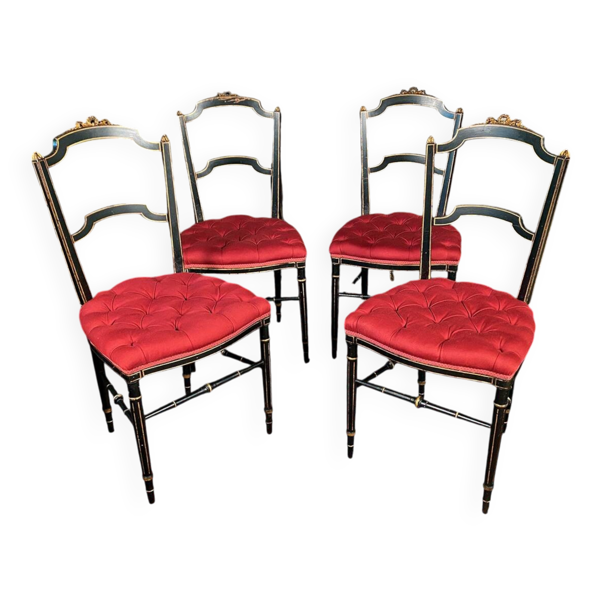 Set of four Napoleon III chairs in black lacquered wood with gold highlights.