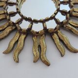 Sun mirror in gilded wood with inlays