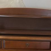 Vintage drop-leaf secretary with a green leather top and inlays.