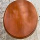 Louis XV oval pedestal table carved in solid cherry wood with cane bedside table