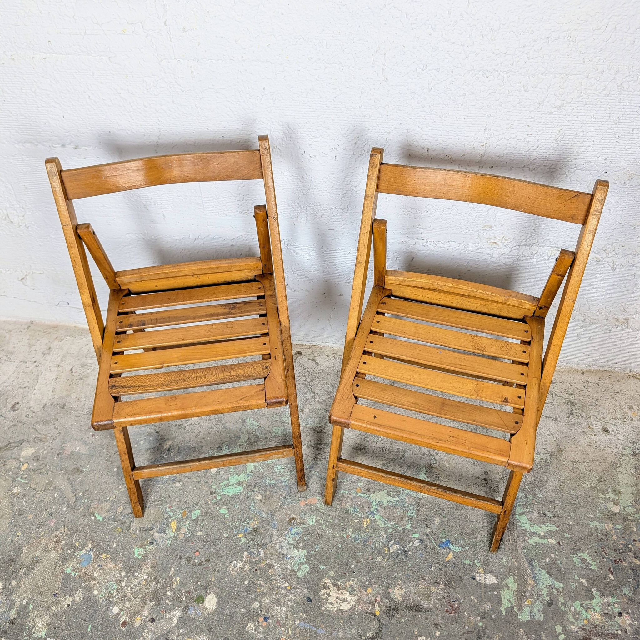 Pair of wooden folding chairs