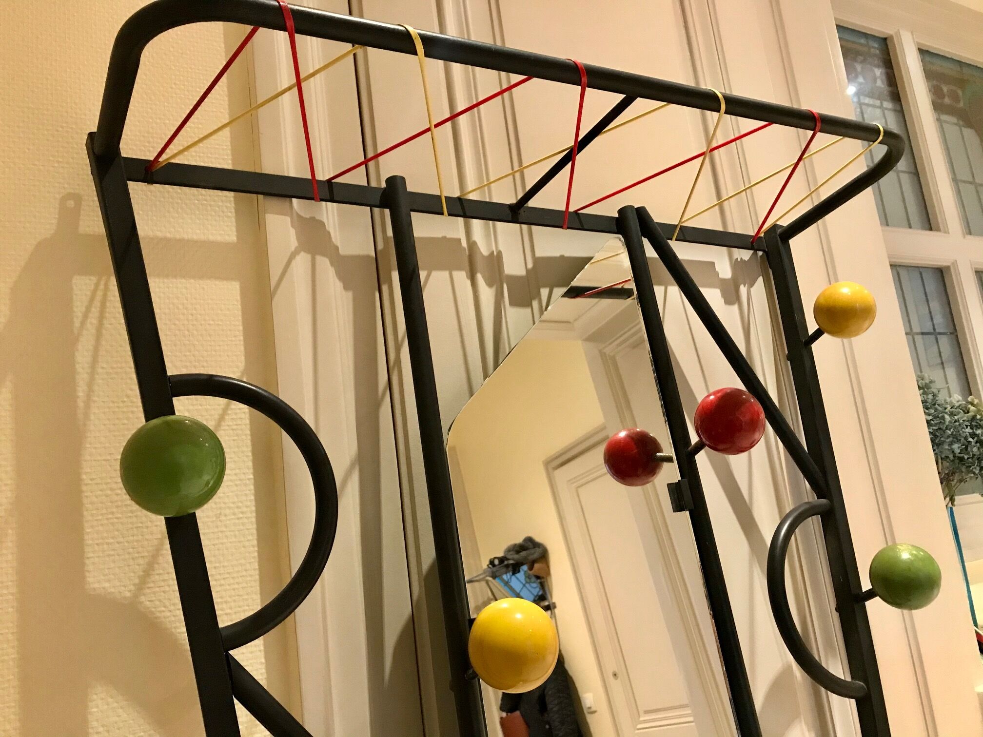 60s wall dressing room door, with colorful balls