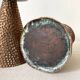 Pair of hammered copper candlesticks from the 1950s