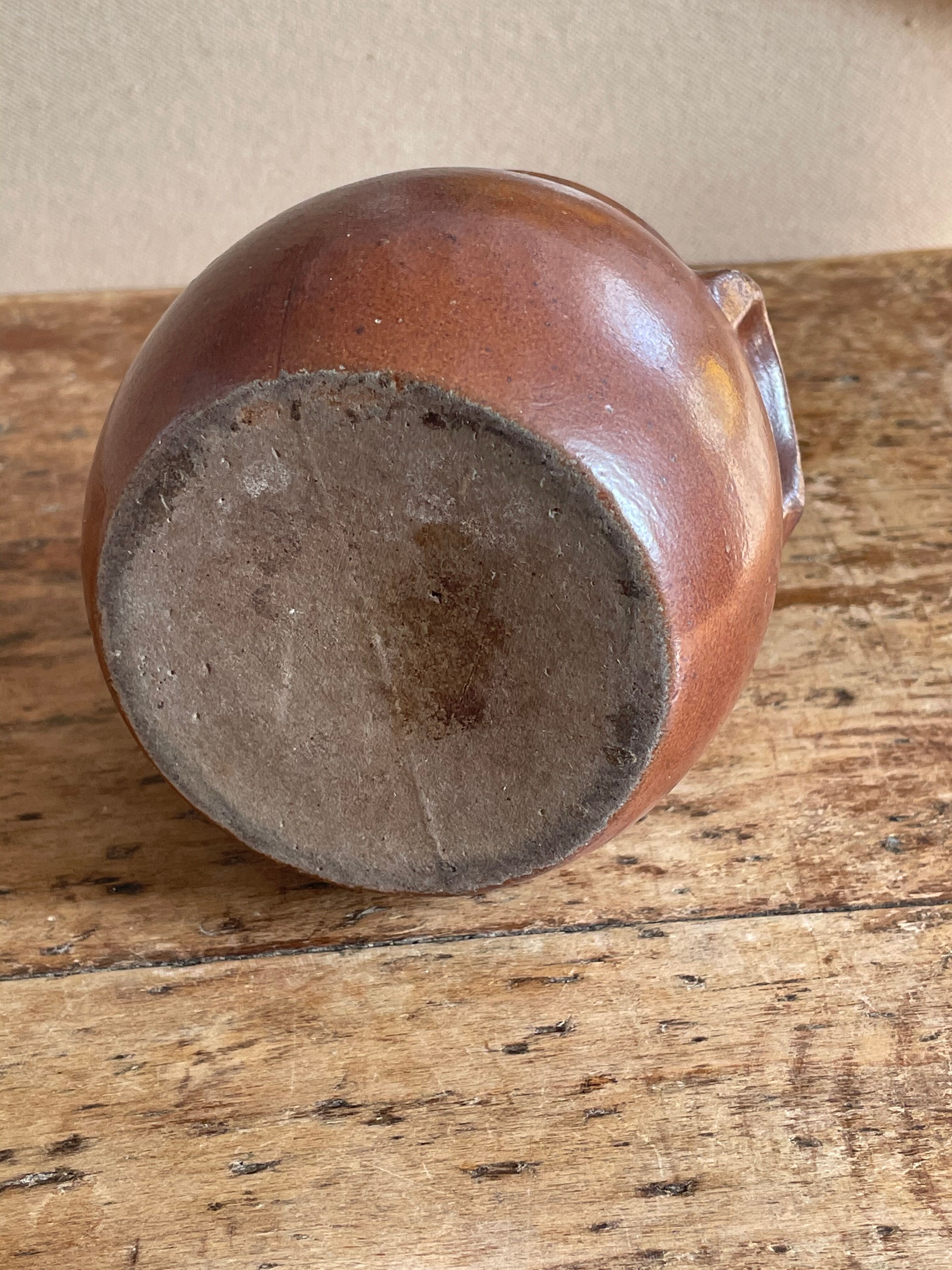 Eared olive pot in brown sandstone