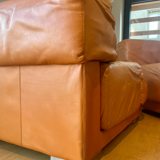 Pair of vintage armchairs Gérard Guermonprez tawny leather and stainless steel, France 1970
