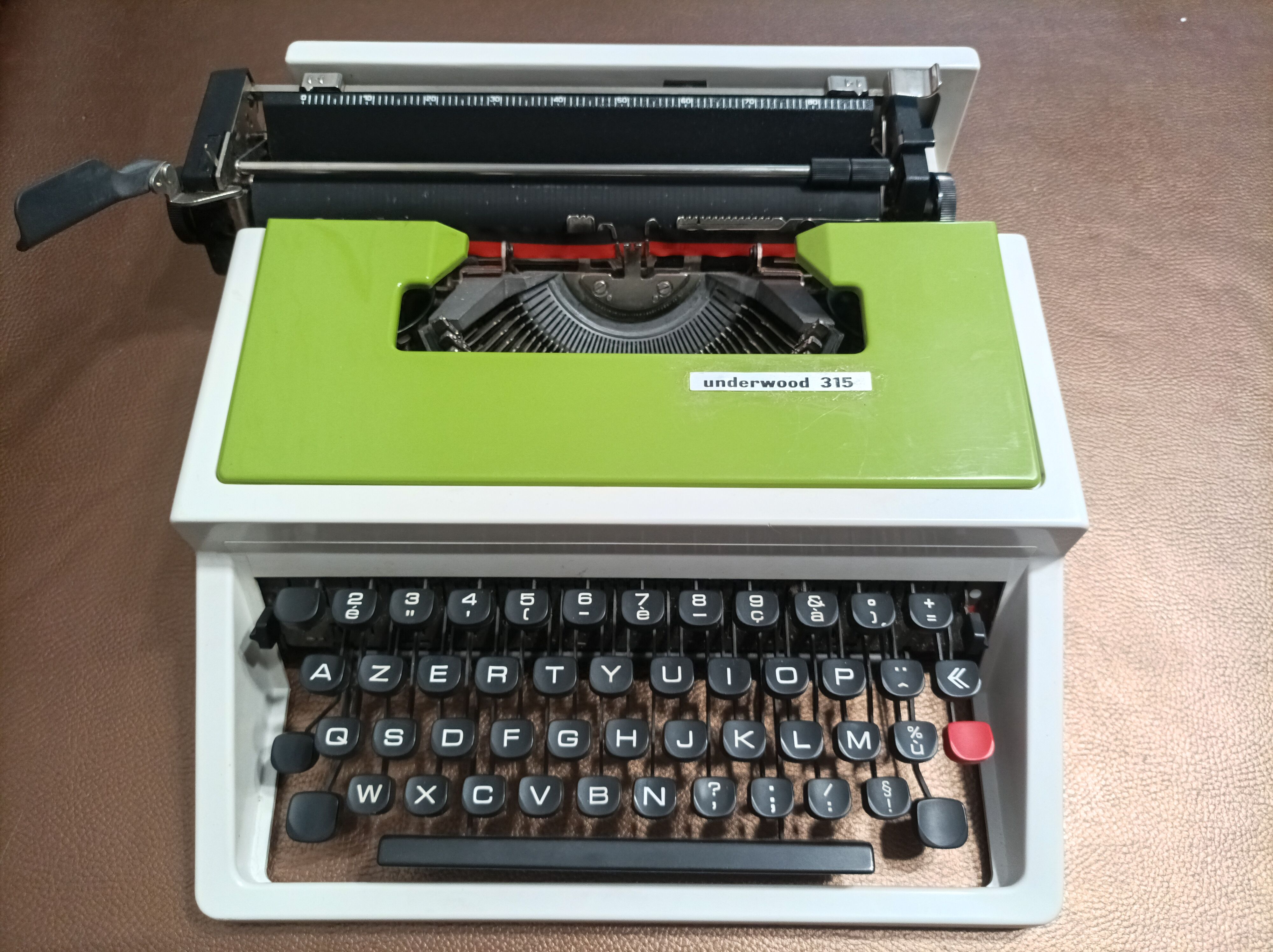 Green Underwood 315 typewriter with its briefcase