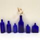 Set of 6 cobalt blue glass pharmacy bottles
