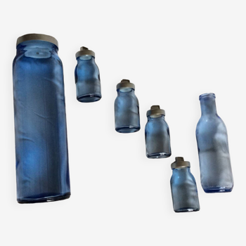 Lot of lagoon blue glass bottles