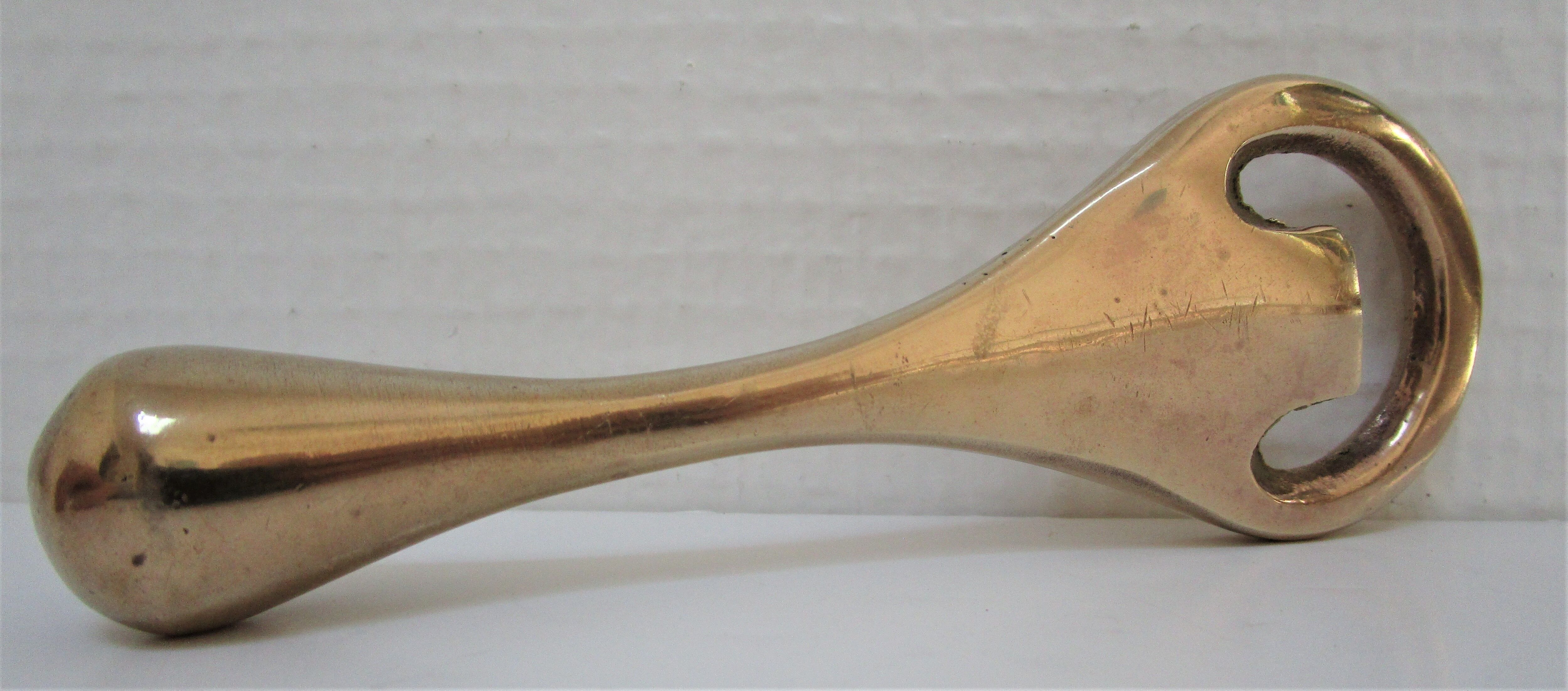 Modernist solid brass bottle opener by Carl Auböck