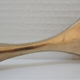 Modernist solid brass bottle opener by Carl Auböck