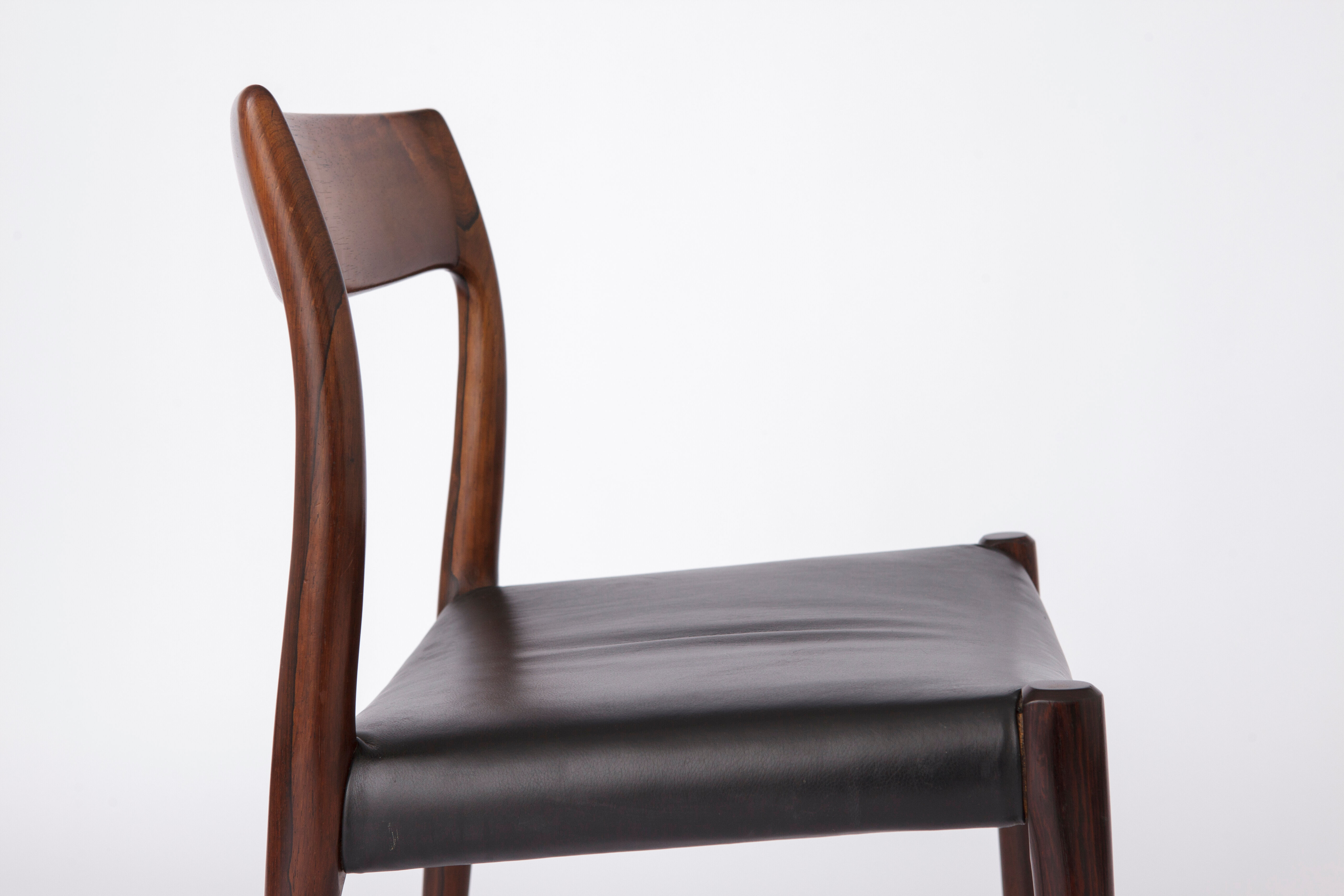 Mid century Rosewood dining chair with leather seat by Niels O. Møller for J.L. Moller