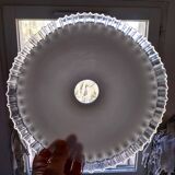 Old lace-edged conical lampshade in opaline