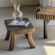 Small stool, rectangular solid teak side table with curved legs.