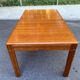 Scandinavian extendable dining table in honey-stained wood for 12 people 1990