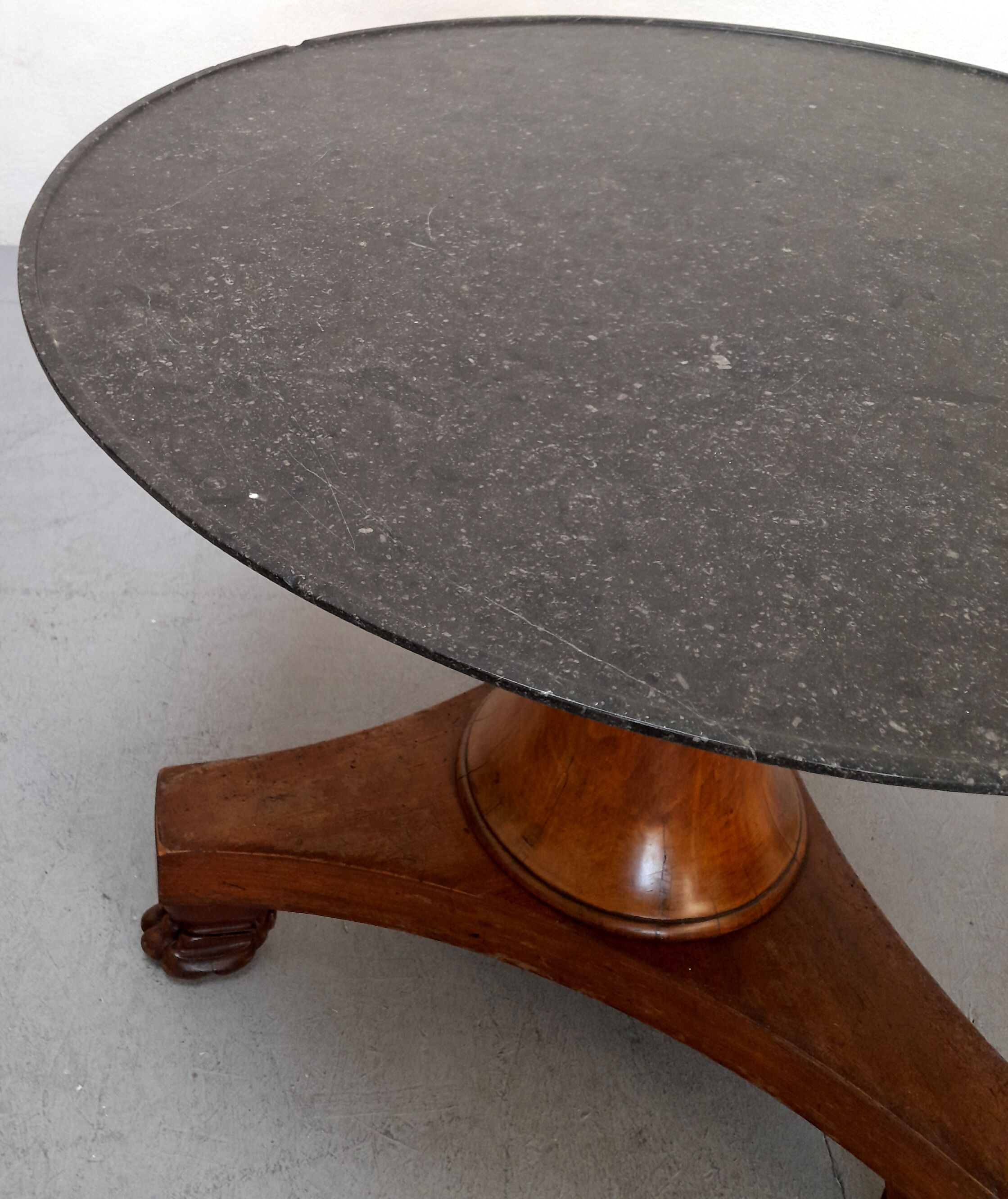 Neo-classical pedestal table in walnut and black marble - French work from the 1930s