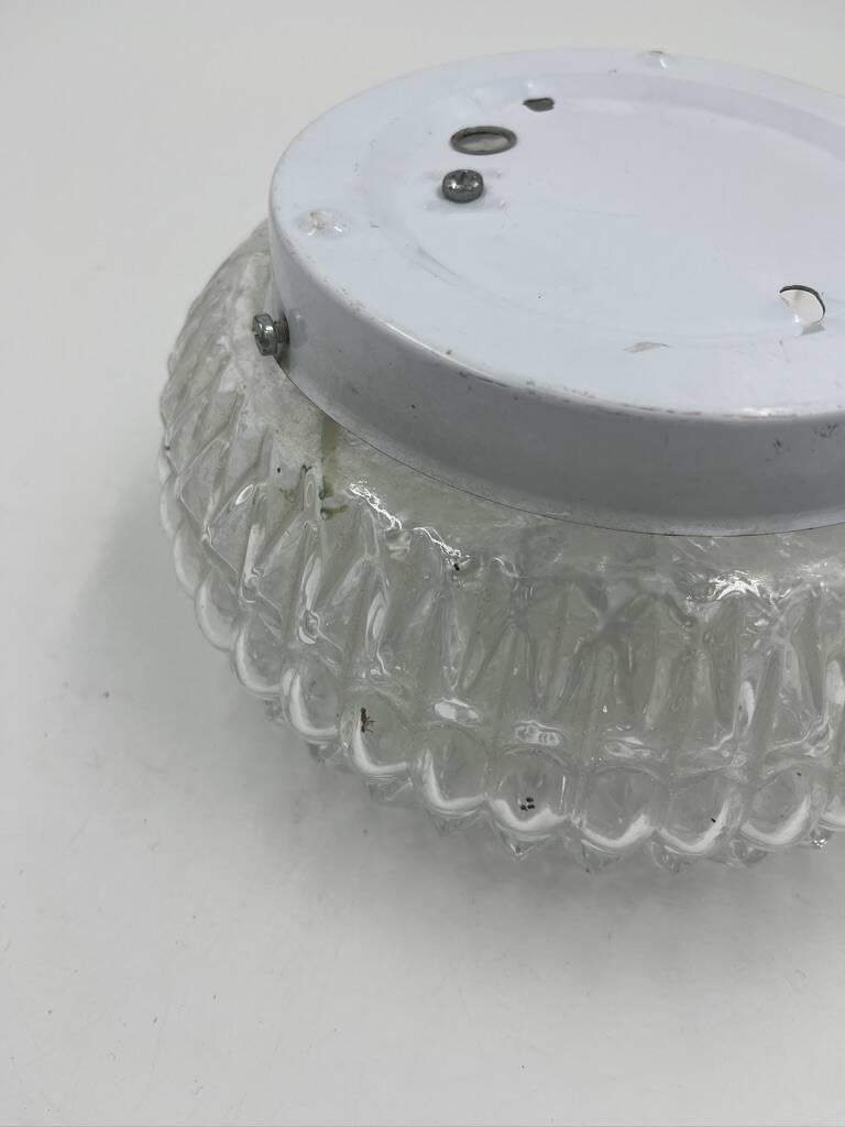 Molded glass ceiling light with relief