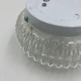 Molded glass ceiling light with relief