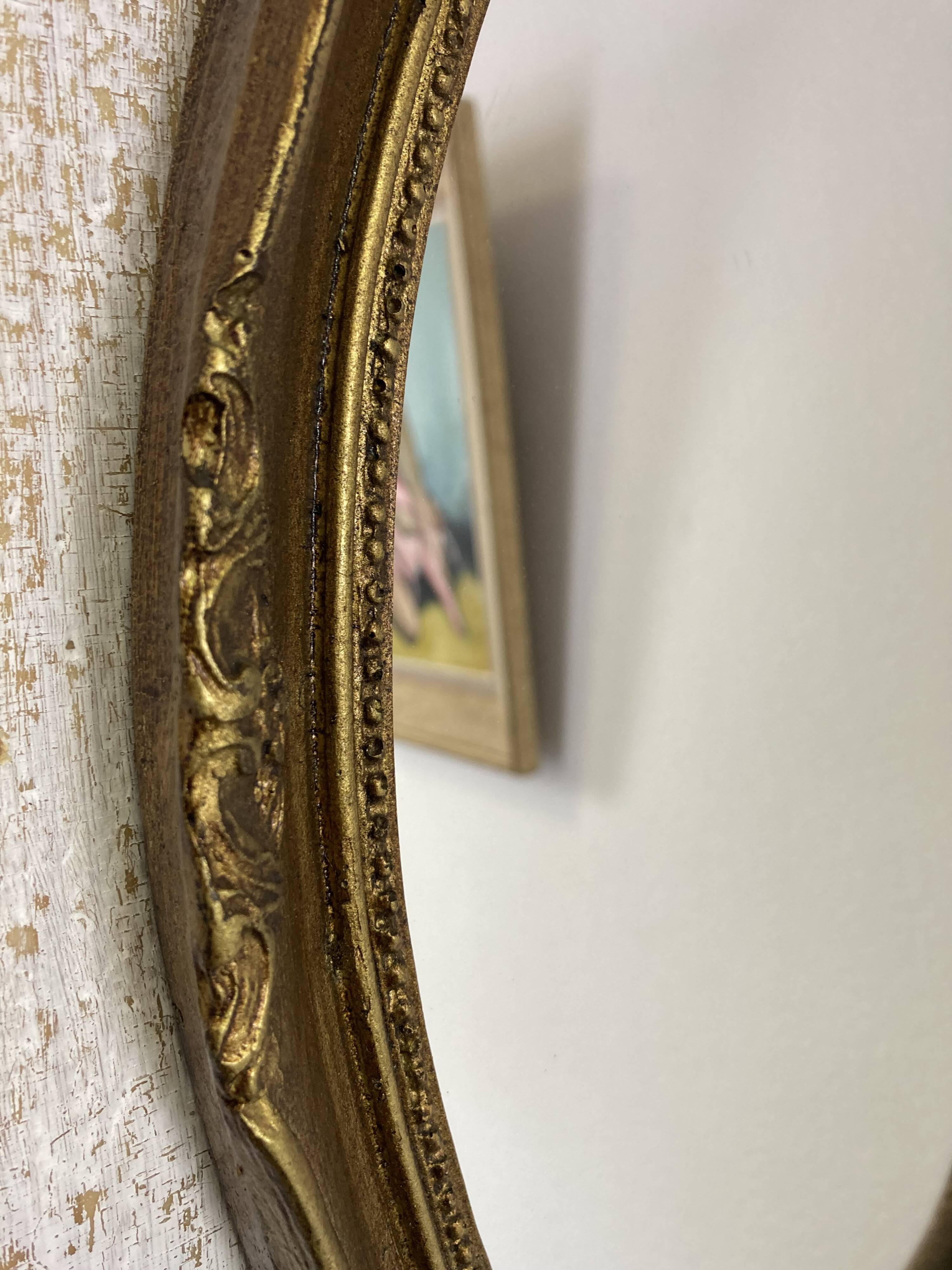 Antique oval mirror